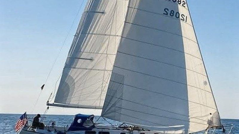 1971 Morgan 42 MKII sailboat gliding on open water under clear skies.
