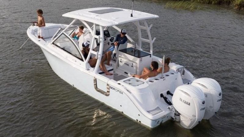 Manufacturer Provided Image: 2025 Sea Fox 268 Traveler boat with passengers on a calm waterway.